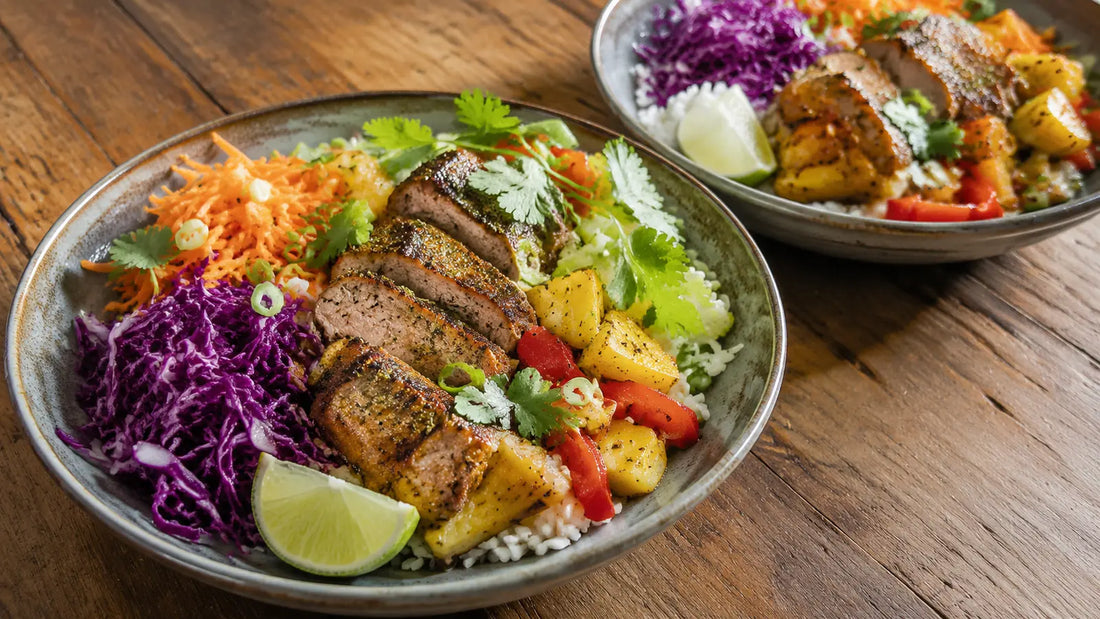 Caribbean Island Spice pork and pineapple rice bowls with red cabbage, carrot, peppers, lime and fresh coriander.