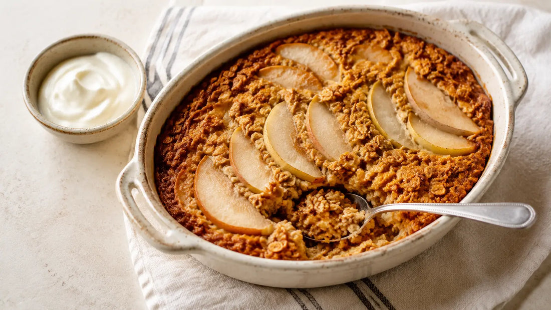 Golden pumpkin spice baked oats with tender pear slices served warm with natural yoghurt.