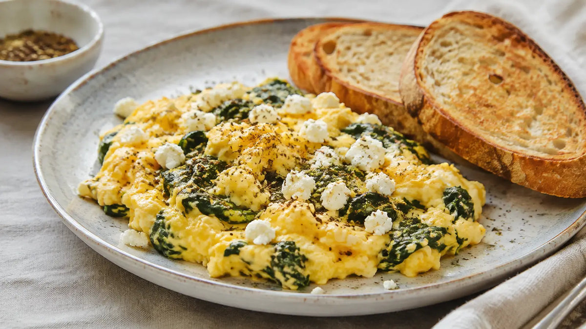 Creamy Za’atar scrambled eggs with wilted spinach, crumbled feta and toasted sourdough.