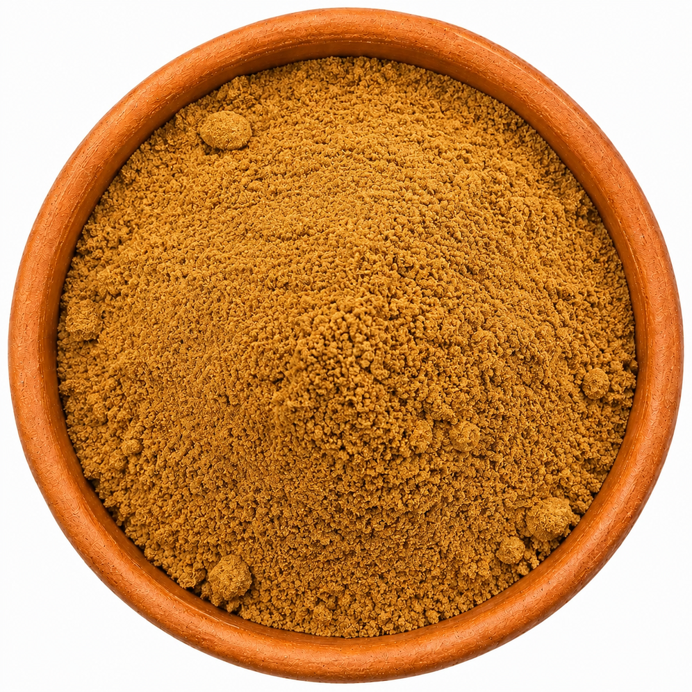 Apple Pie Spice Blend in a rustic terracotta dish, photographed from above on a clean white background.