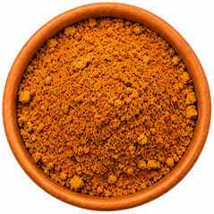 Bangalore Curry Blend - Extra Hot Indian Curry Spice in a terracotta bowl on a white background, showing the rich golden-orange handcrafted curry seasoning.